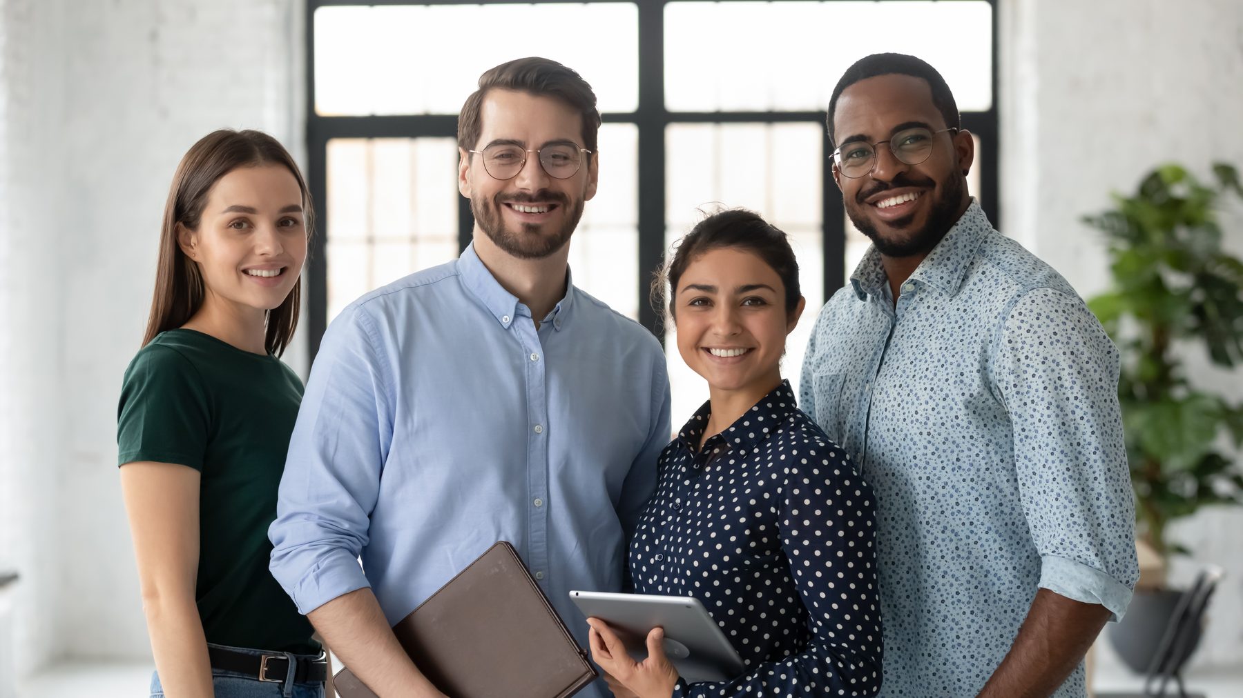 Multicultural professional team collaborating
